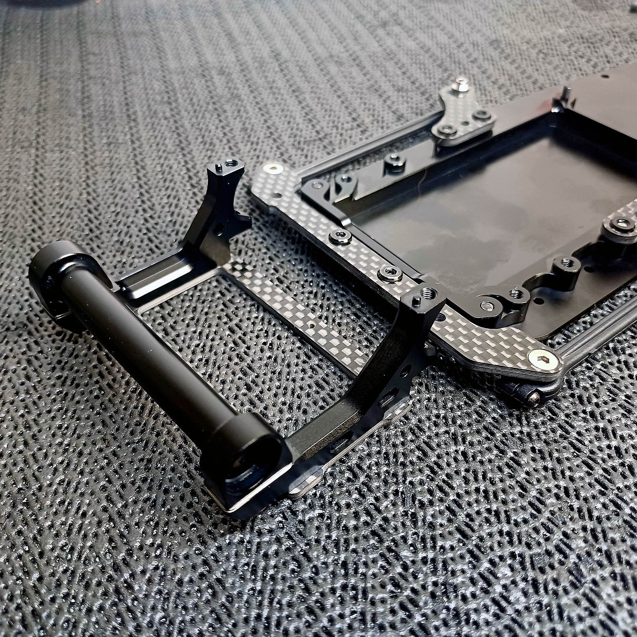 A black rectangular object with metal parts